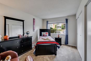 Bedroom Featuring Large Windows